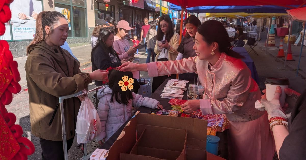 Families connecting at a community fair